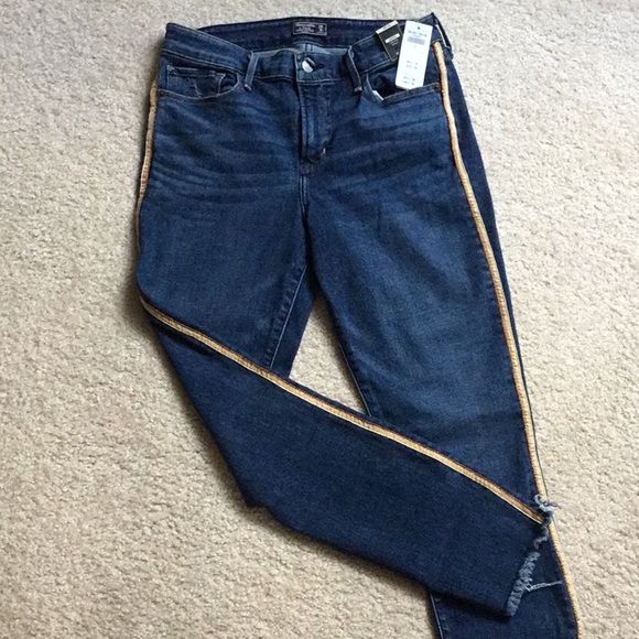 Abercrombie & Fitch Denim - Low rise, with frayed bottoms. NWT.